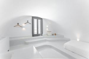 Posteľ alebo postele v izbe v ubytovaní Philosophia Luxury Villa