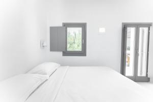 Posteľ alebo postele v izbe v ubytovaní Philosophia Luxury Villa
