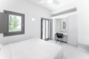 Posteľ alebo postele v izbe v ubytovaní Philosophia Luxury Villa