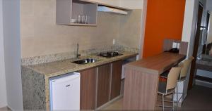 Una cocina o zona de cocina en Thermas Resort Alta Vista 2 quartos Caldas novas