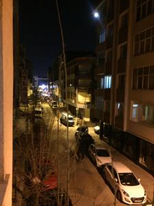 a view of a street at night with cars parked at Private Room in Istanbul #71 in Istanbul