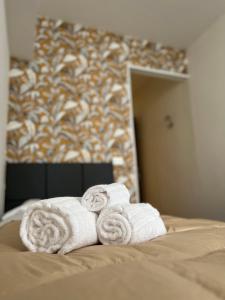 A bed or beds in a room at Hotel Brenta