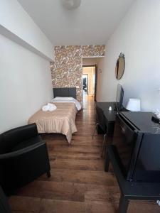 A bed or beds in a room at Hotel Brenta