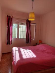Postel nebo postele na pokoji v ubytování Vakantiewoning Melrose Place - Mil Palmeras - 900 m van zee
