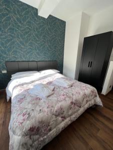 A bed or beds in a room at Hotel Brenta