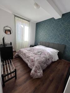 A bed or beds in a room at Hotel Brenta