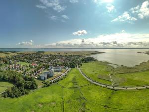 an aerial view of a town next to a body of water at Alte Seefahrtschule am Ostseestrand in Wustrow