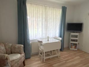 TV a/nebo společenská místnost v ubytování Connys Appartement