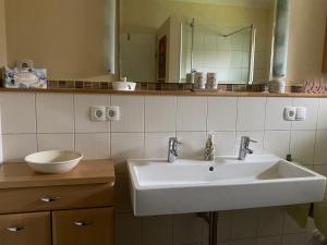 Koupelna v ubytování Connys Appartement
