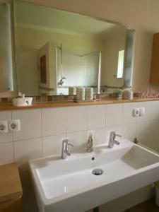 Koupelna v ubytování Connys Appartement + 13 fotografií