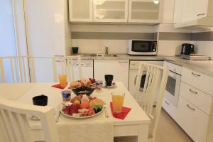 Η κουζίνα ή μικρή κουζίνα στο Stay Nexus Galaxy Center