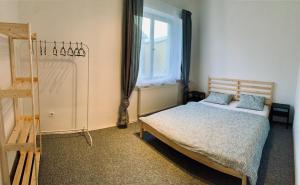 Postel nebo postele na pokoji v ubytování Apartmány Horní Blatná