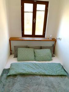 Postel nebo postele na pokoji v ubytování Apartmány Horní Blatná