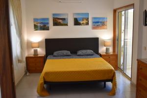 Postel nebo postele na pokoji v ubytování Monte da Ria Guest House