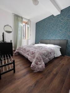 A bed or beds in a room at Hotel Brenta