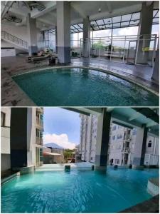 une grande piscine au milieu d'un bâtiment dans l'établissement Room Apartemen by GIANDARA, à Sayang