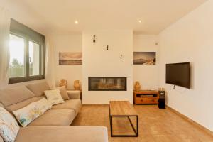 TV a/nebo společenská místnost v ubytování Villa con piscina Ibiza centro