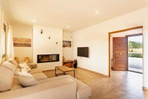 TV a/nebo společenská místnost v ubytování Villa con piscina Ibiza centro