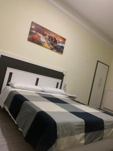 Postel nebo postele na pokoji v ubytování Lili & Aurora Home