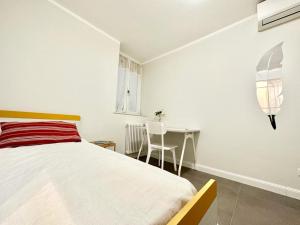 A bed or beds in a room at PALAZZO LA ZAGARA