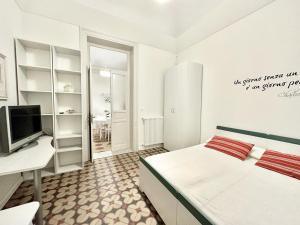 A bed or beds in a room at PALAZZO LA ZAGARA