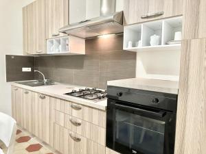 A kitchen or kitchenette at PALAZZO LA ZAGARA
