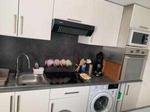 Virtuvė arba virtuvėlė apgyvendinimo įstaigoje Appartement detox au pied du semnoz