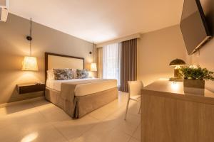 Postel nebo postele na pokoji v ubytování Madisson Boutique Hotel Cartagena