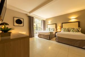 Postel nebo postele na pokoji v ubytování Madisson Boutique Hotel Cartagena