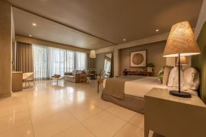 Postel nebo postele na pokoji v ubytování Madisson Boutique Hotel Cartagena