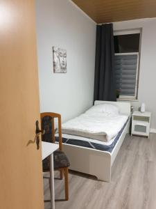 Katil atau katil-katil dalam bilik di FeWo Nina 3 - Monteurwohnung