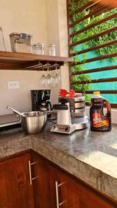 Cucina o angolo cottura di Ubuntu Glamping