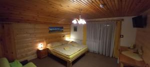 Postel nebo postele na pokoji v ubytování ASPEN
