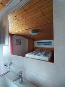 Postel nebo postele na pokoji v ubytování Haus Bianca