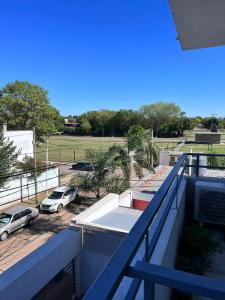 a balcony with a view of a parking lot at Multi home in Concepción del Uruguay