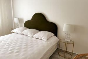 Łóżko lub łóżka w pokoju w obiekcie VILLA LA QUIETUDE