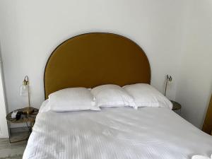 Łóżko lub łóżka w pokoju w obiekcie VILLA LA QUIETUDE