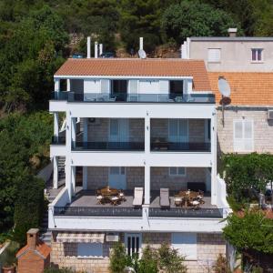 an aerial view of a house with a patio at Apartments Tomas in Dubrovnik