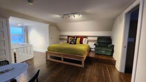 Un pat sau paturi într-o cameră la Les Suites KAISHI