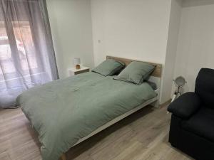 Posteľ alebo postele v izbe v ubytovaní Le Sapeur