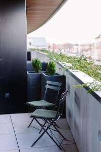 A seating area at Design Apartman - Free parking