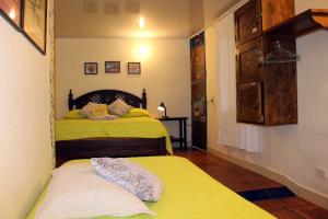 Letto o letti in una camera di Casa Encuentro Ecolodge, Outdoor Gym and Yoga