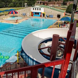 a water slide at a swimming pool at Guest Apartment at Commercial Street Studio in Lebanon