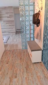 a room with a closet with a purse on the wall at Safta Apartaments in Câmpulung