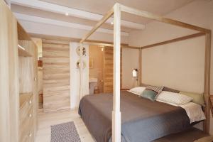 Ένα ή περισσότερα κρεβάτια σε δωμάτιο στο Borgo Lianti Rooms