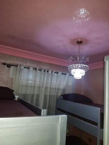 Postel nebo postele na pokoji v ubytování Appartement A1 ARENA DE MARTIL