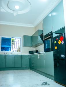 Kuchyň nebo kuchyňský kout v ubytování CORNERSTONE APARTMENTS + 15 fotografií