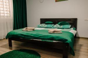 Postel nebo postele na pokoji v ubytování Casa de vacanță Perla Colibitei