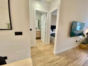 TV a/nebo společenská místnost v ubytování SÖK Pedregalejo seafront Holidays Homes