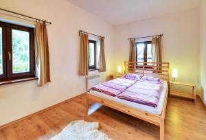 Postel nebo postele na pokoji v ubytování Apartmány a chata MONTANUS